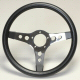 Standard Grant 5 bolt pattern steering wheel. This is a Grant GT Sport Steering Wheel. Black foam cushion grip with chrome spokes and a 3 spoke design. It is 13 inches in diameter.